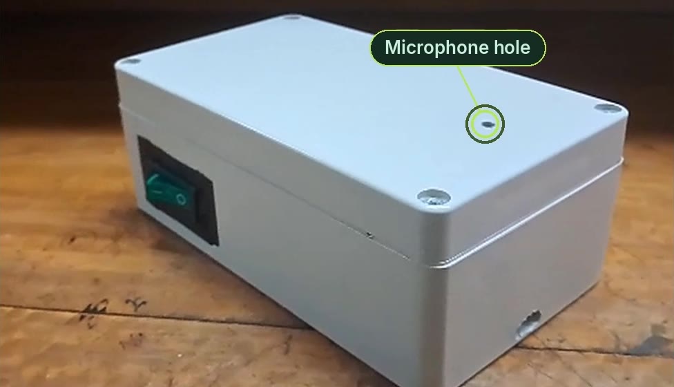 Sealed enclosure with power switch and microphone hole